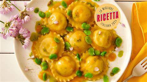 Ravioli di patate con pomodorini gialli e fave