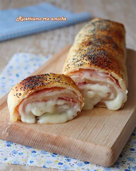 Rotolo di pasta sfoglia prosciutto provola