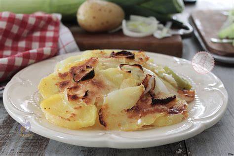 Patate e porri al forno dorati