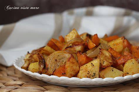 Patate carote cipolle al forno