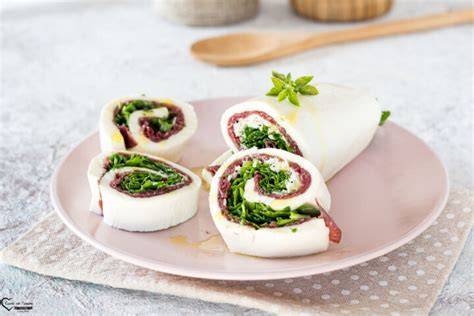 Rotolo di mozzarella con bresaola rucola e Grana