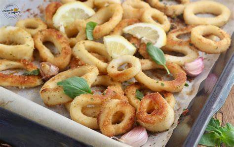 Calamari impanati su teglia da forno