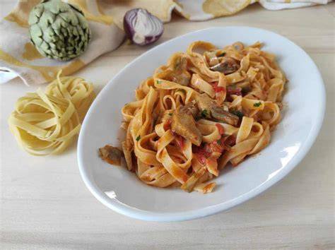 Tagliatelle di seppia con guanciale