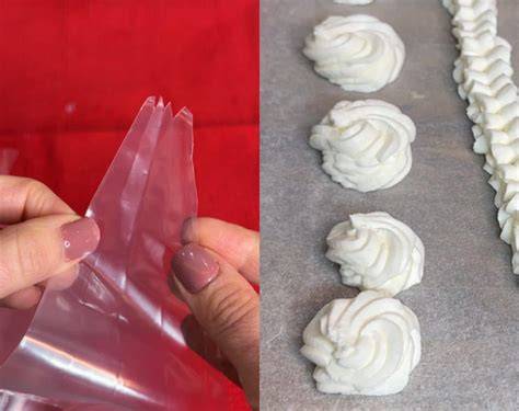 Farcitura dei manicotti con sac à poche