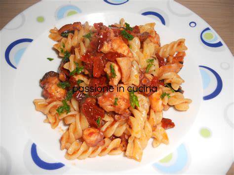 pasta con polpo e pomodori secchi