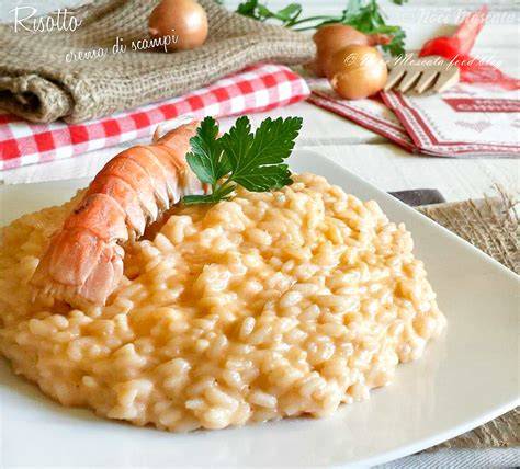 Risotto cremoso con tartare di scampi