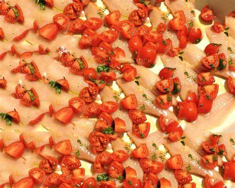filetti di triglia con pomodorini al forno
